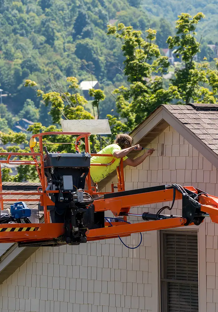 painting beige siding in Colorado