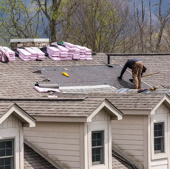 colorado roofers working on a shingle roof